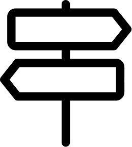 A directional signpost with multiple arrows pointing in different directions.